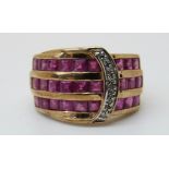 A 9ct gold ring set with square rubies and diamonds in a buckle design,