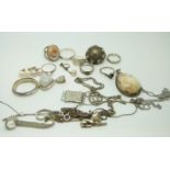 A collection of silver jewellery to include seven rings, pearl set earrings,