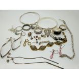 A bracelet set with labradorite cabochons, two silver bracelets, a silver necklace, a silver bangle,