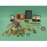 A collection of costume jewellery etc to include beads, Stratton compact, brooches, marcasite,
