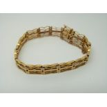 A 9ct gold gate bracelet