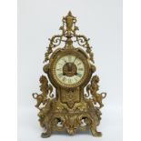 A brass 19thC Cartel style cast French mantel clock in 18thC style,