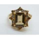 A 9ct gold ring set with a smoky quartz (size N)