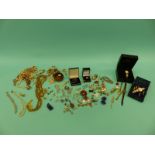 A collection of costume jewellery including Mizpah, cufflinks, earrings, beads,