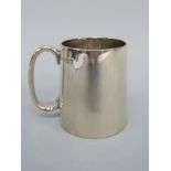 A George VI Scottish hallmarked silver tankard of plain tapering form,