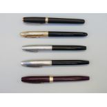 Five Sheaffer fountain pens including three White Dot examples,