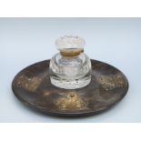 A Victorian turned coromandel inkstand with decorative gilt metal mounts and cut glass inkwell,