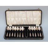 A cased set of 12 George V hallmarked silver teaspoons and tongs, Sheffield 1931/2,