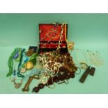 A collection of costume jewellery including beads,