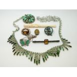 A Victorian brooch set with a large oval quartz,