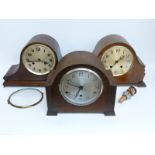 A 1930 'Napoleon hat' cased two train mantel clock with two train movement and Arabic dial,