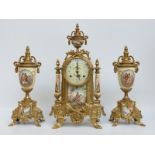 A c1970 French style brass clock garniture with painted porcelain panels,