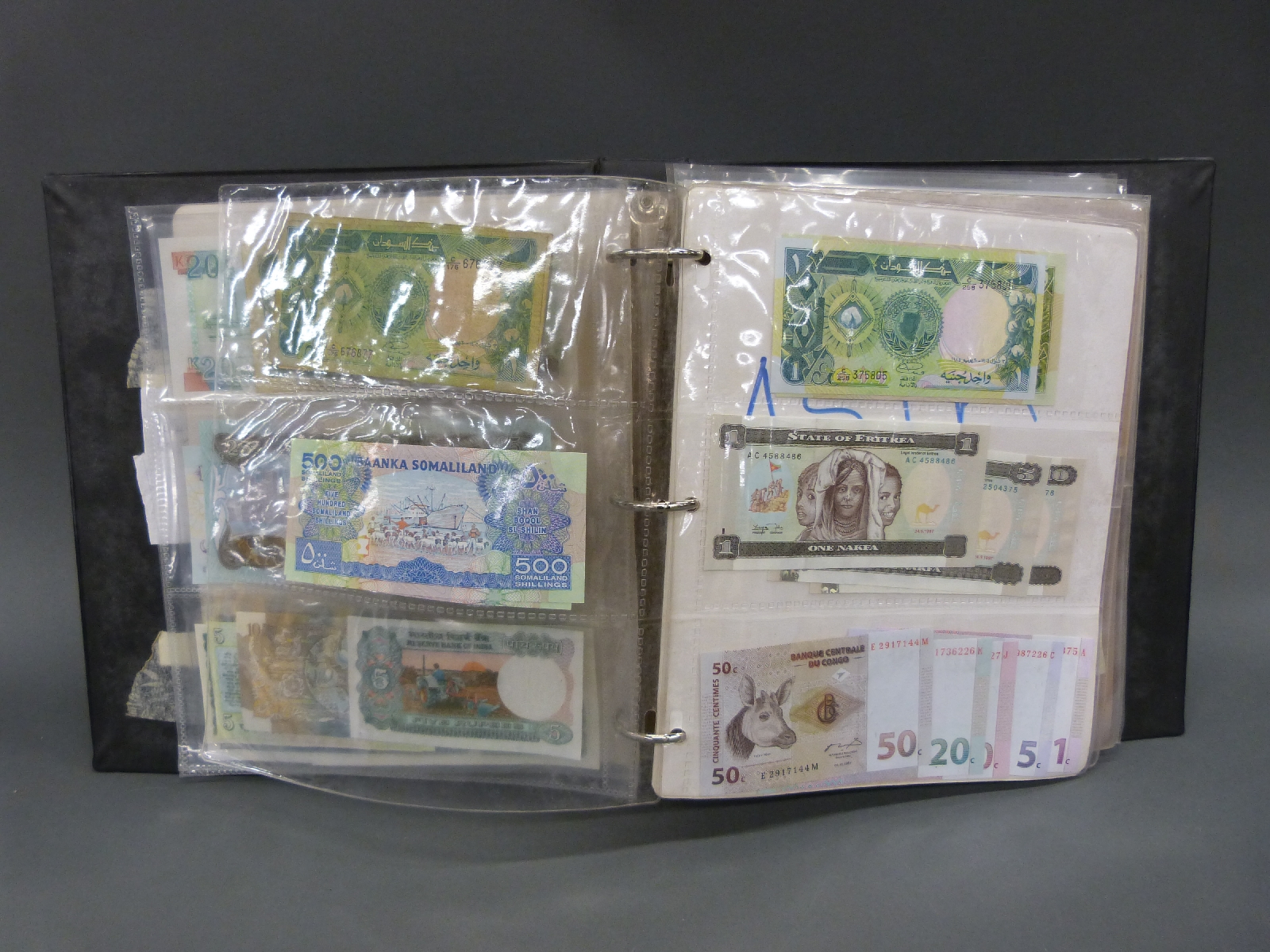 A collection of world bank notes in an album, approximately 180 in all, many uncirculated, - Image 2 of 6