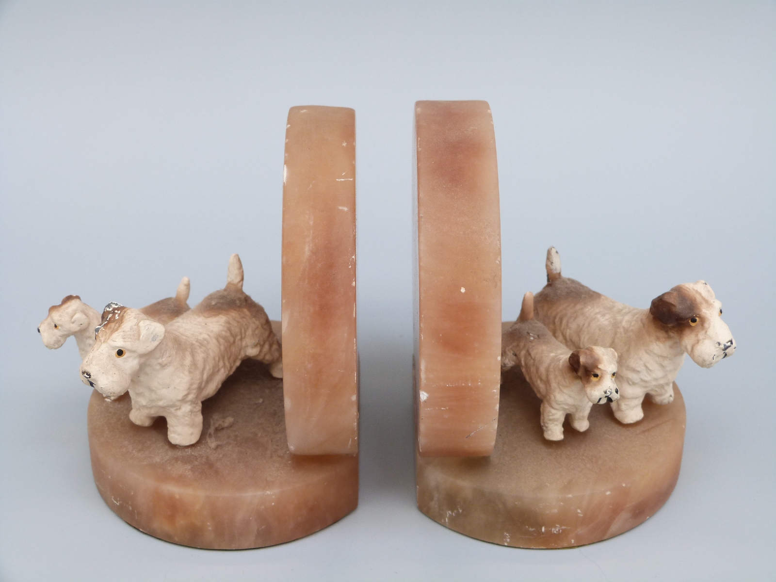 A pair of Art Deco onyx bookends cold painted bronze Sealyham terriers with puppies, H11. - Image 2 of 3