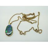 A 9ct gold necklace set with a black opal on a 9ct gold chain, 4.
