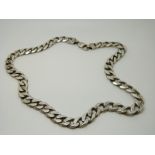 A silver curb link necklace marked 925, 92.