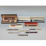 A collection of pens including boxed Swan self filler, boxed Sheaffer, boxed White Dot,