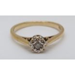 A 9ct gold ring set with a diamond in a star setting, 2.