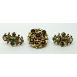 A pair of Austro Hungarian earrings set with pearls & green and pink foiled paste together with