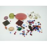 A collection of gemstones including agate and an intaligo seal