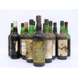 Fourteen 70/75cl bottles of vintage sherry, most with missing labels but including Sandeman,