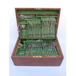 A Victorian and later oak cased 12 place setting canteen of Kings pattern hallmarked silver cutlery