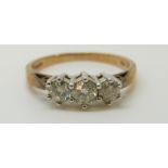 A 9ct gold ring set with three diamonds, total diamond weight approximately 0.
