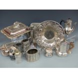 A quantity of silver plate to include coffee pots, trays, jugs, serving dishes, candlesticks,