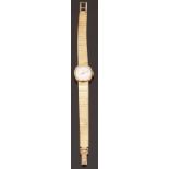 Eterna 9ct gold ladies wristwatch with two-tone hands and baton markers and silvered face,
