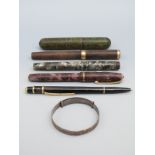 Four vintage pens including New Bond Easiflow and Swan and a silver bracelet