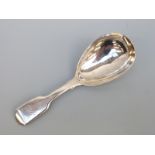 A William IV hallmarked silver tea caddy spoon, London 1836 maker William Eaton,
