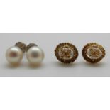 A pair of yellow metal earrings set with pearls and a pair of 18ct white gold earrings set with a