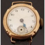 9ct gold ladies wristwatch with single blued hand, subsidiary seconds dial, and Arabic numerals,