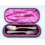A cased hallmarked silver spoon and fork,