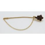 A 9ct gold stick pin set with garnets- NOT GOLD RING THEN DELETE