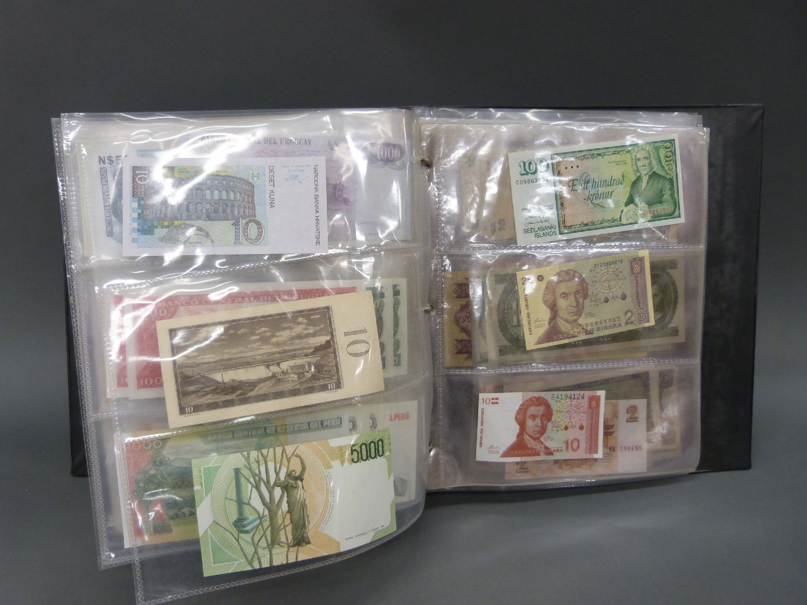 A collection of world bank notes in an album, approximately 180 in all, many uncirculated, - Image 5 of 6