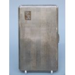 A large engine turned cigarette case, Birmingham 1951, length 14cm,