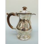 A George V Mappin & Webb hallmarked silver hot water jug, London 1933, height 19",