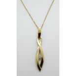 A 9ct gold necklace set with a cubic zirconia, 3.