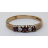 A 9ct gold ring set with rubies and diamonds (size T)