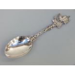 A Dutch hallmarked silver spoon with ship finial and import marks for Chester and Boaz Moses