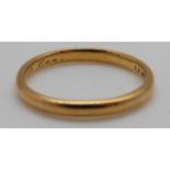 A 22ct gold wedding band, 2.