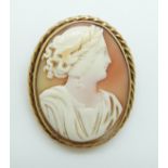 A 9ct gold brooch set with a shell cameo depicting a young woman, 4.