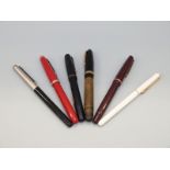 Six fountain pens to include Osmiroid, two Swan examples with 14k gold nibs,