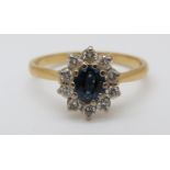 An 18ct gold ring set with an oval sapphire of approximately 0.