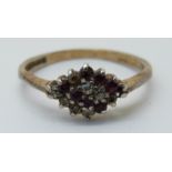 An 9ct gold ring set with rubies and diamonds (size R)