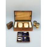 A cased gentleman's ivory brush set,