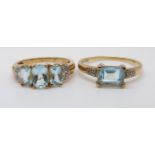 Two 9ct gold rings set with aquamarines and diamonds (size P and T)