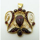 A Victorian pendant set with bohemian cut garnets, 3.3 x 2.