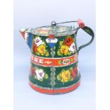 A vintage hand decorated bargeware watering can,